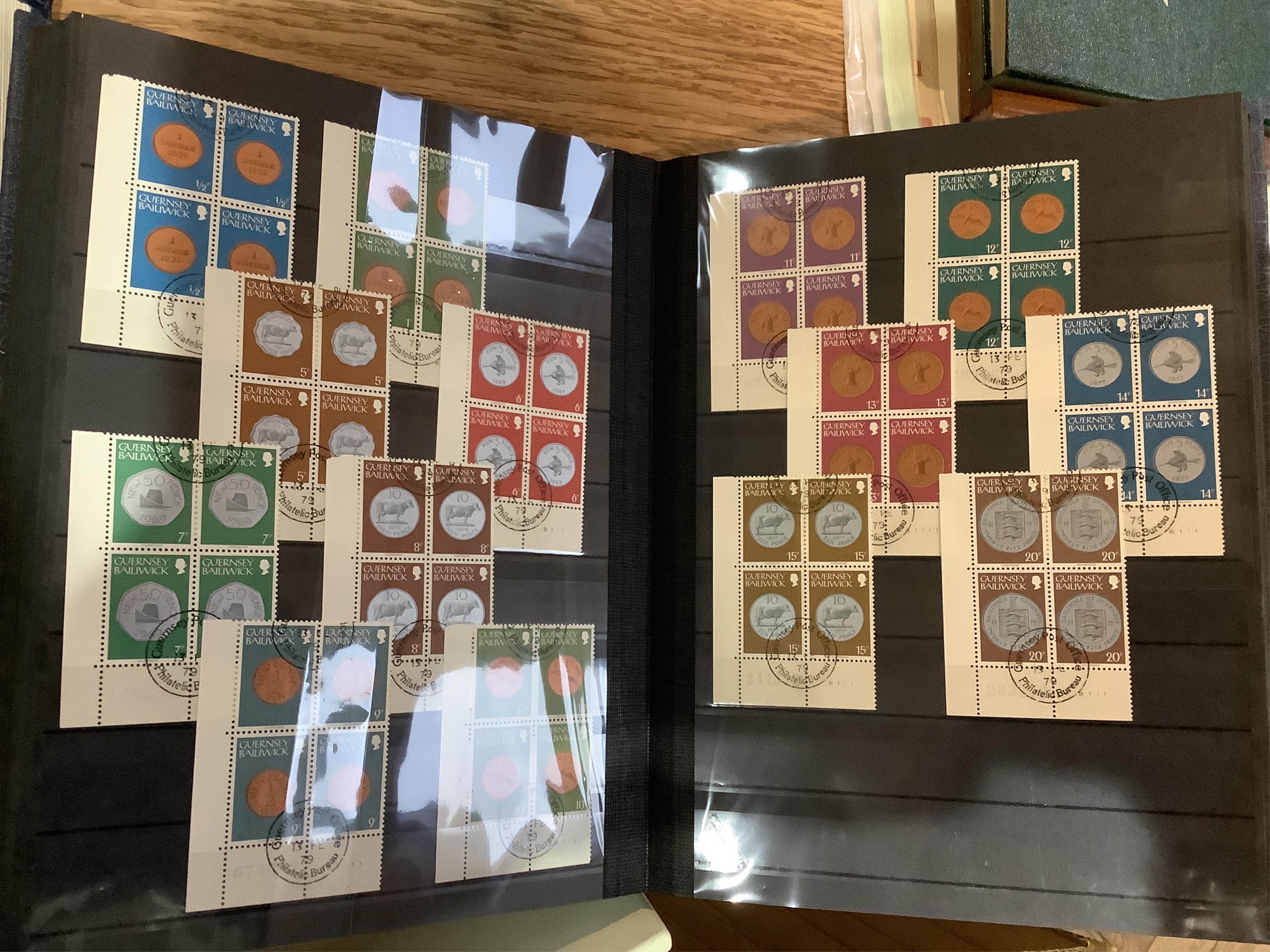 A collection of assorted stamps relating to coins and medals in four stock books. Condition - fair to good